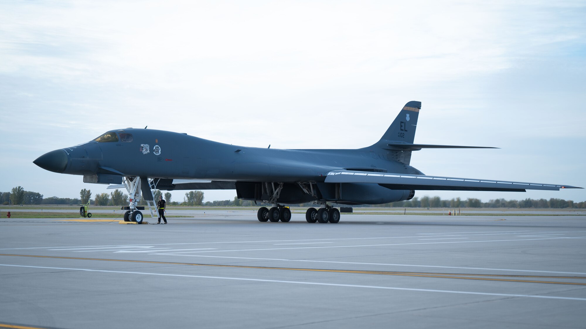 A B-1B Lancer stands on a runway.