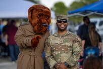 Airman with McGruff character