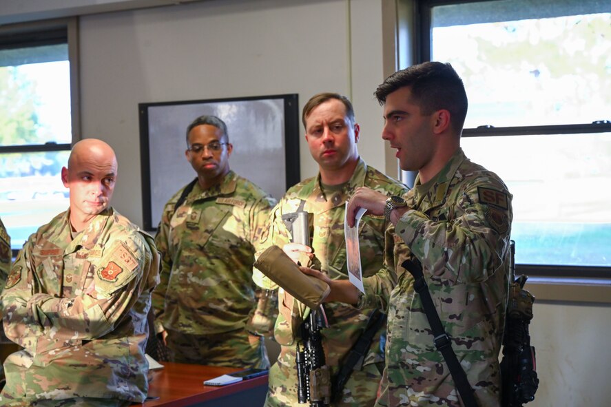 U.S. Air Force Capt. Nicolas Niazian, 891st Missile Security Forces Squadron (MSFS) operations officer, delivers a mission brief for Operation Cerberus at Camp Ripley, Minnesota, Sept. 22, 2024. Operation Cerberus was a readiness exercise designed to simulate a deployed environment and give an opportunity for Airmen of 891 MSFS to test their expeditionary skills.