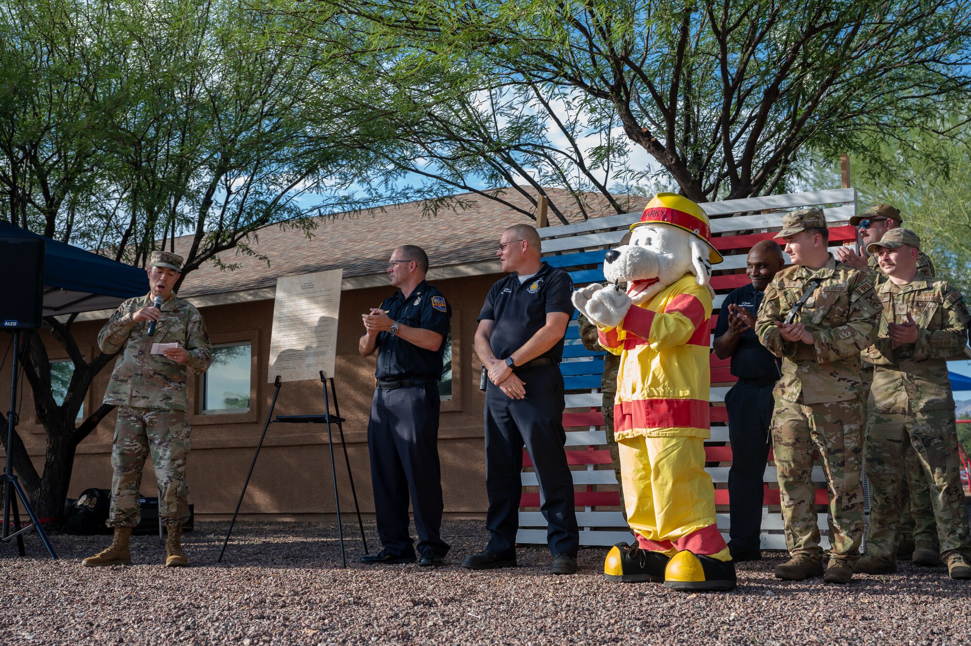 U.S. Air Force Col. Daniel Craig, 355th Mission Support Group commander, gives a speech before signing the Fire Prevention Week proclamation at Davis-Monthan Air Force Base, Arizona, Oct. 1, 2024. The proclamation was signed to signify the base’s commitment to fire safety and preparedness. (U.S. Air Force photo by Airman 1st Class Jasmyne Bridgers-Matos)