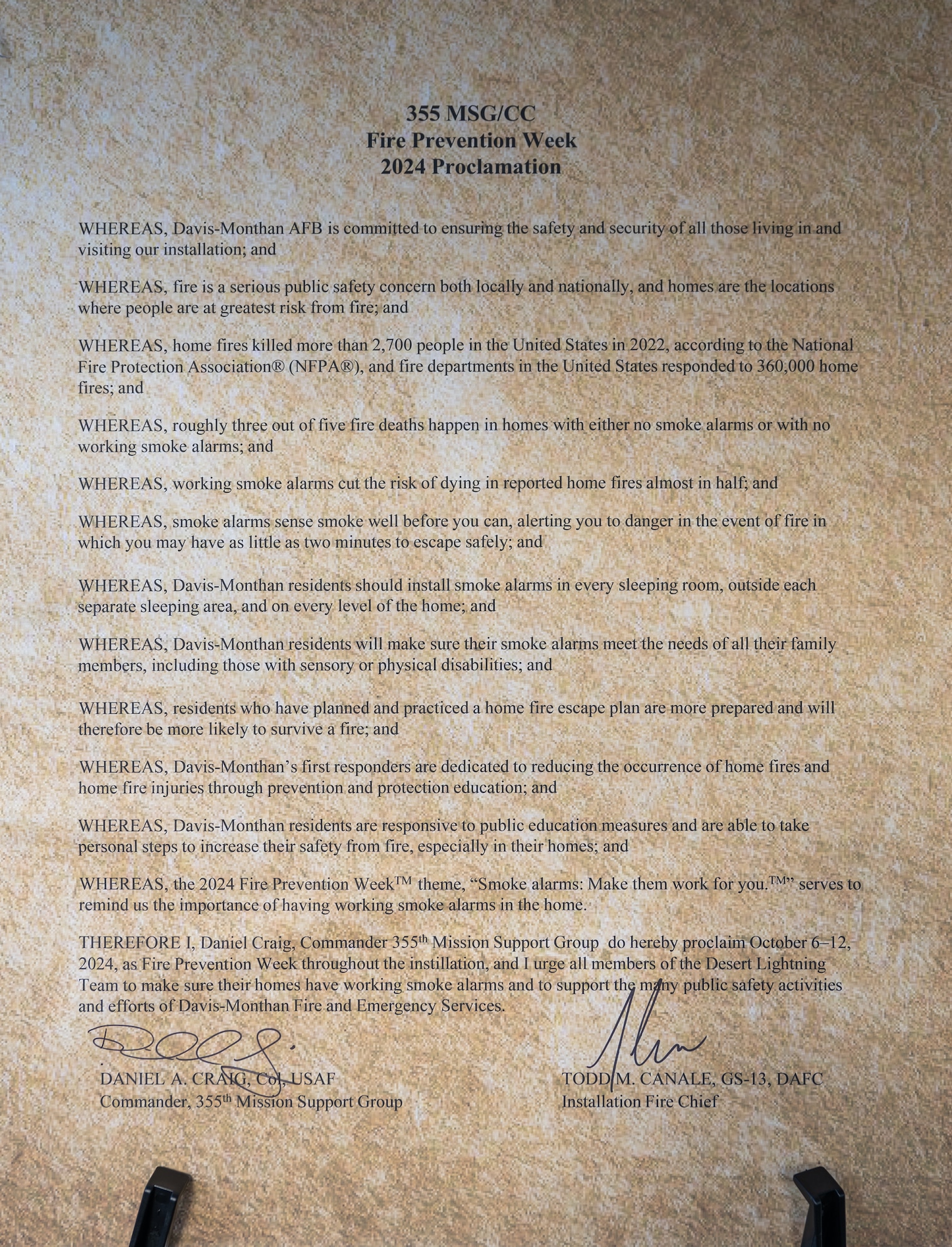 A proclamation in support of Fire Prevention Week is on display at Davis-Monthan Air Force Base, Arizona, Oct. 1, 2024. Fire Prevention Week was observed to raise awareness on fire safety and commemorate the Great Chicago Fire of 1871 that claimed the lives of 300 citizens. (U.S. Air Force photo by Airman 1st Class Jasmyne Bridgers-Matos)