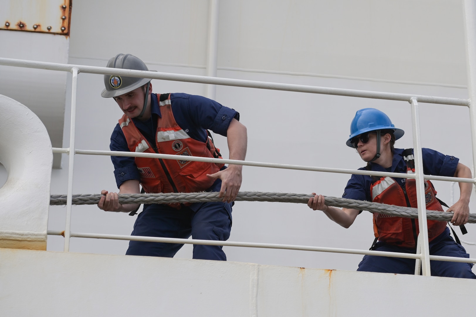 U.S. Coast Guard Cutter Healy (WAGB 20) crewmembers conduct mooring operations as the icebreaker departs Coast Guard Base Seattle, Oct. 1, 2024. Healy is designed to break 4.5 feet of ice continuously at three knots and can operate in temperatures as low as -50 degrees Fahrenheit. (U.S. Coast Guard photo by Petty Officer 1st Class Steve Strohmaier)