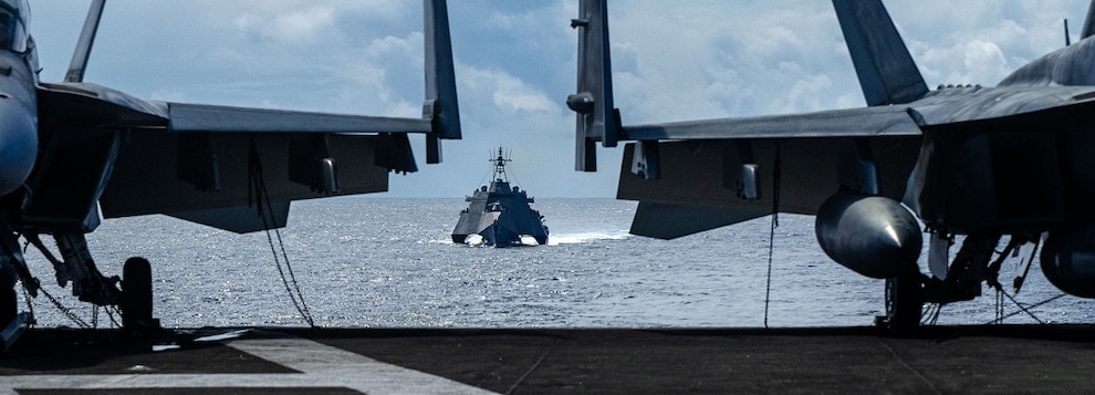 The Independence-class littoral combat ship USS Mobile (LCS 26) prepares to come alongside the Nimitz-class aircraft carrier USS Theodore Roosevelt (CVN 71) for a fueling-at-sea, Oct. 1, 2024.