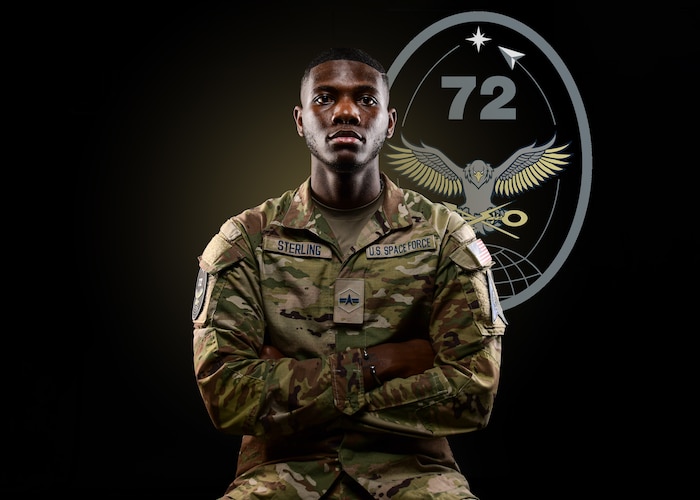 Spc. 3 Demicheal Sterling poses for a photo.
