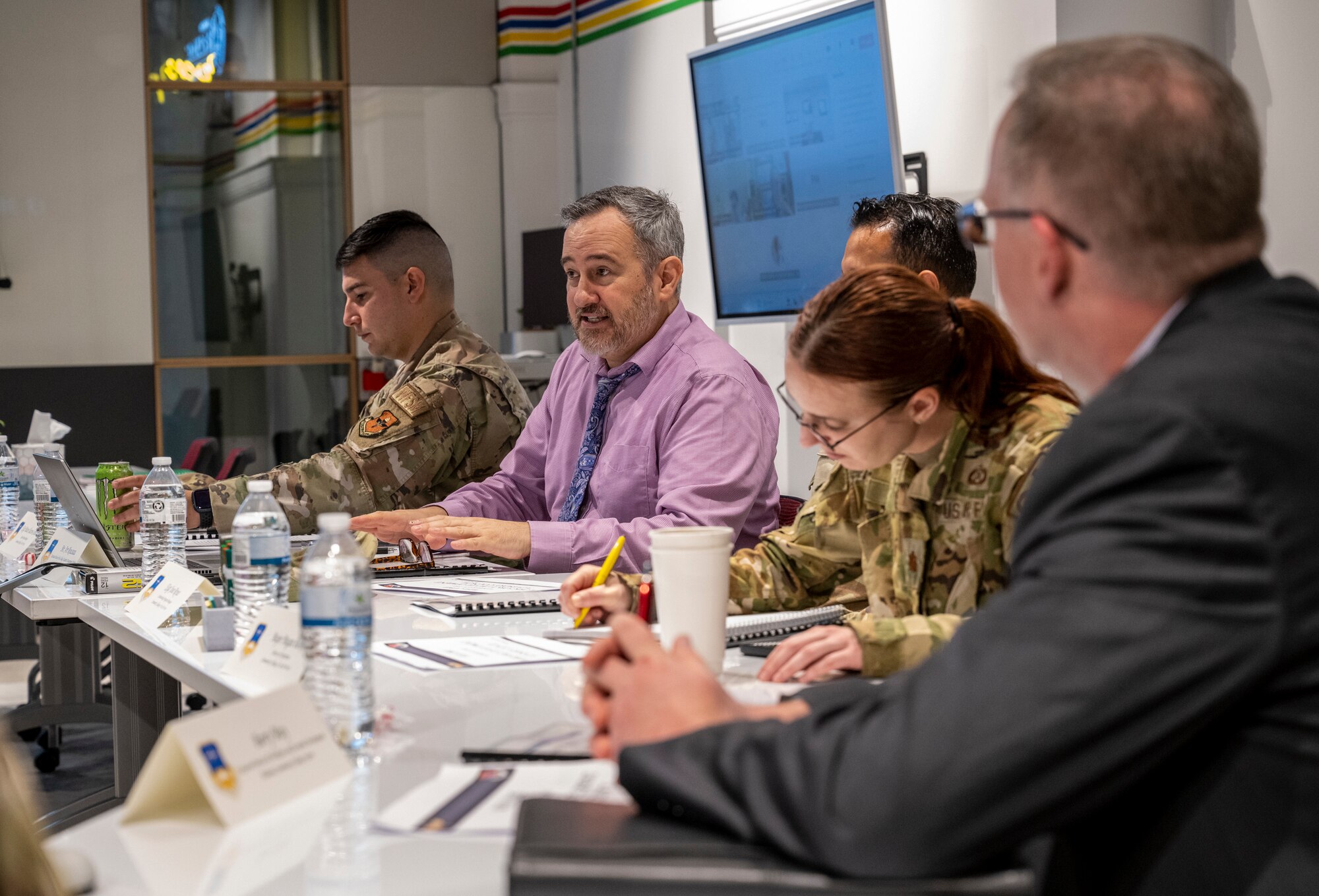Arthur Rousseau, Community College of the Air Force Credentialing Programs director, briefs members of the Workforce Development Advisory Council during the council's inaugural meeting at the Kress Building in Montgomery, Alabama, Sept. 26, 2024. (U.S. Air Force photo/Brian Ferguson)