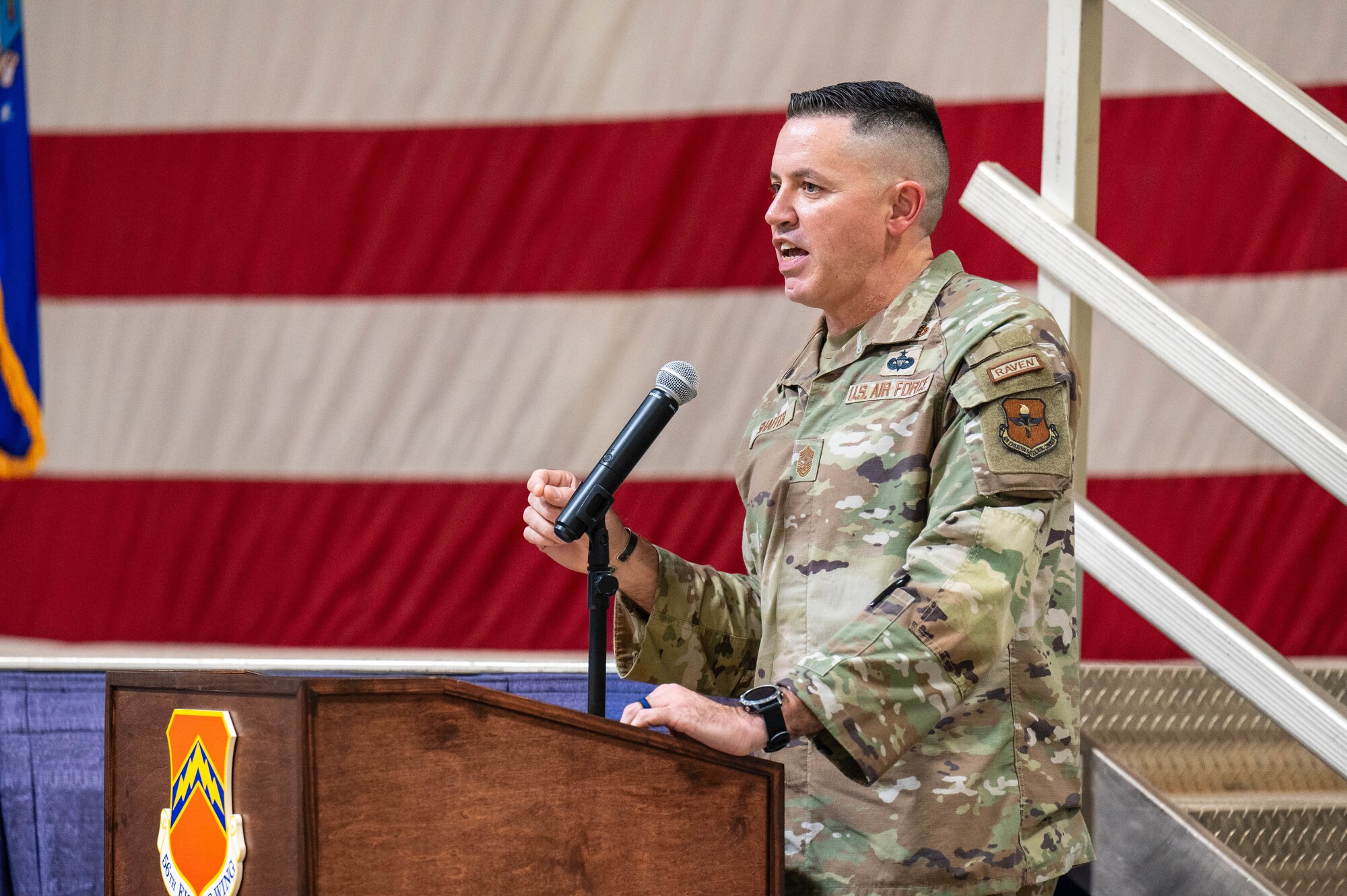 U.S. Air Force Chief Master Sgt. Jason Shaffer, 56th Fighter Wing command chief, gives closing remarks during the 2024 Honorary Commander induction ceremony, Sept. 26, at Luke AFB, Arizona.