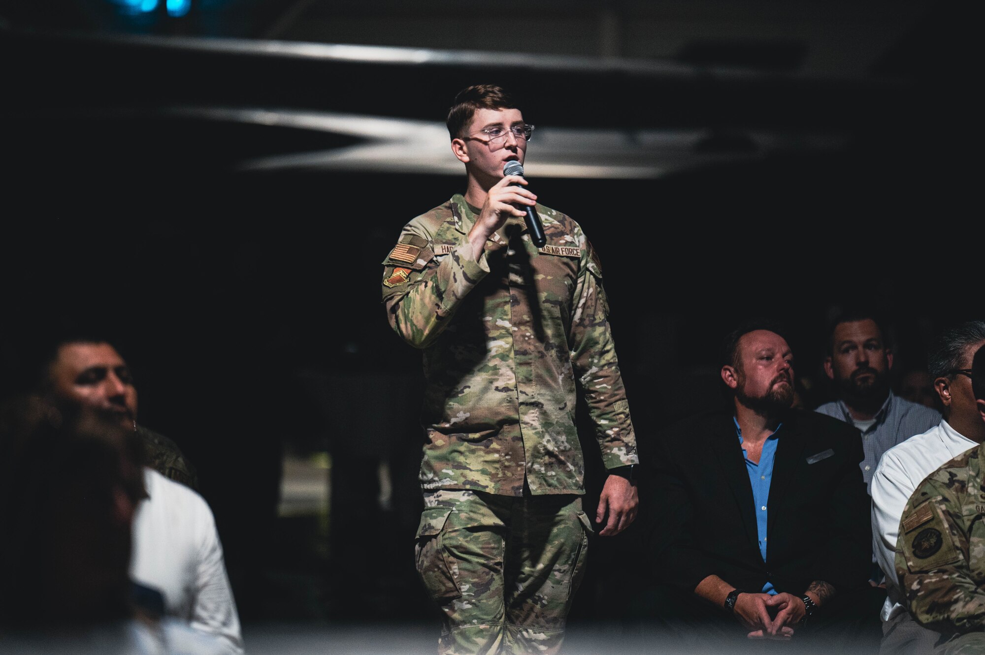 U.S. Air Force Senior Airman Mason Hargrove, 56th Fighter Wing public affairs specialist, narrates the Luke Air Force Base 2024 mission video during the 2024 Honorary Commander Induction Ceremony, Sept. 26, at Luke AFB, Arizona.