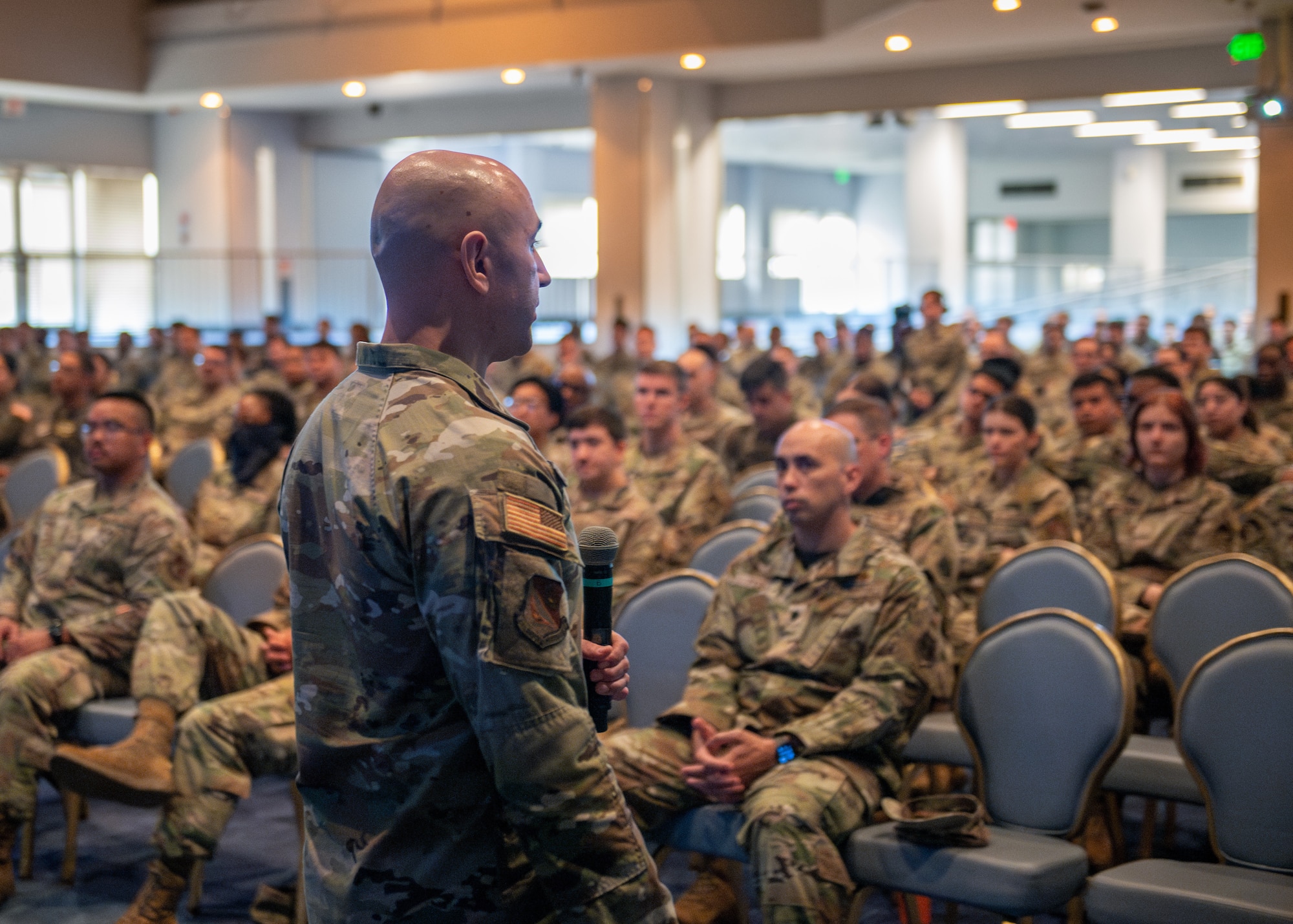 The command chief speaks to a crowd during all call event.