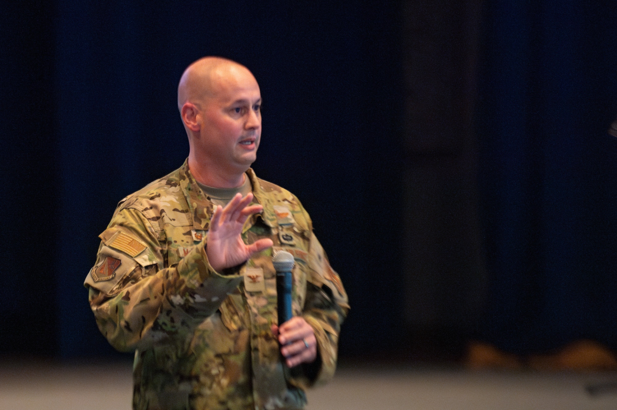 374th Airlift Wing commander speaks during the all-call event.