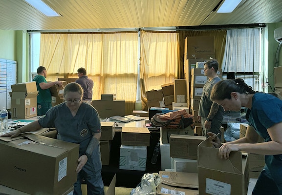 An 11-person team with Expeditionary Medical Facility (EMF) Kilo worked together to inventory supplies after arriving at Hospital Escuela, Tegucigalpa, Honduras, Sep. 17, 2024. In collaboration with joint forces and the partner nation, EMF Kilo conducted its first orthopedic surgical mission alongside Hospital Escuela medical staff treating and performing surgical procedures on patients with oncologic or orthopedic traumatic injuries. (U.S. Navy photo by Lt. Cmdr. Sheree Blackwell)