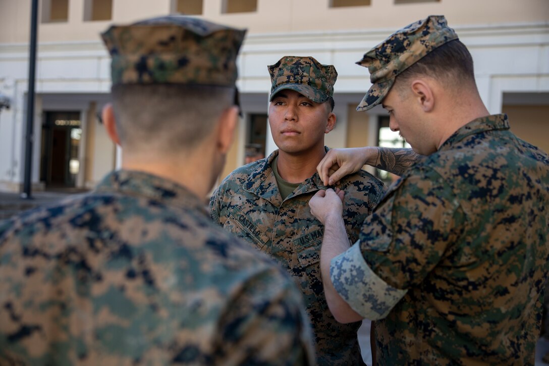 U.S. Marine Corps Cpl. Juan Castillo, a network administrator with Task Force 61/2 (TF 61/2), is promoted to the rank of sergeant at Naval Support Activity, Naples, Italy, Oct. 1, 2024. TF 61/2 is a forward-deployed command element in support of U.S. Sixth Fleet operations in the U.S. European Command and U.S. Africa Command, and is deployed in the U.S. Naval Forces Europe-Africa/U.S. Sixth Fleet area of operations, employed by U.S. Sixth Fleet to support U.S. allied and partner interests. Castillo is a native of Oxnard, California. (U.S. Marine Corps photo by Cpl. Marc Imprevert)