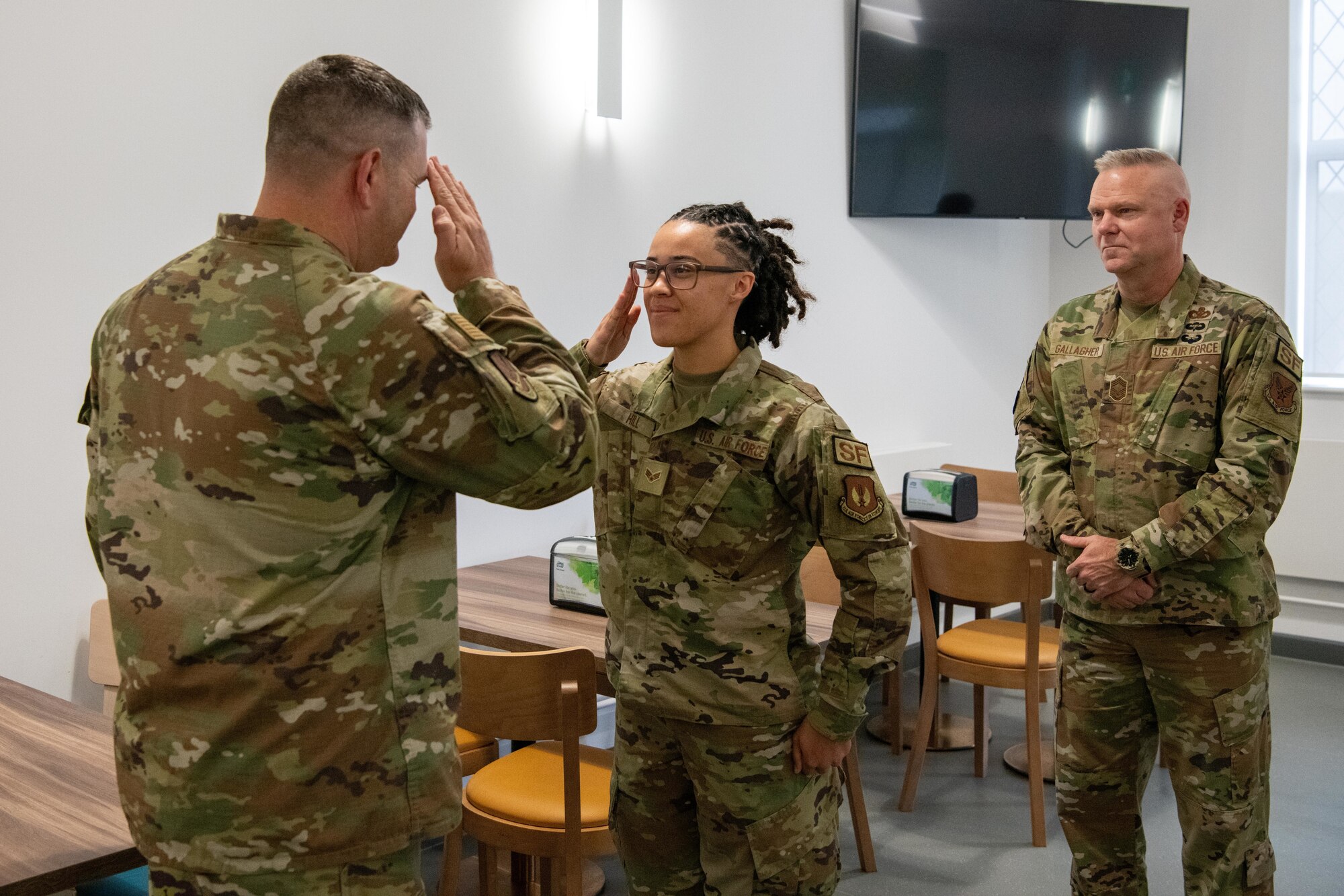 The director of Security Forces recognizes an Airman