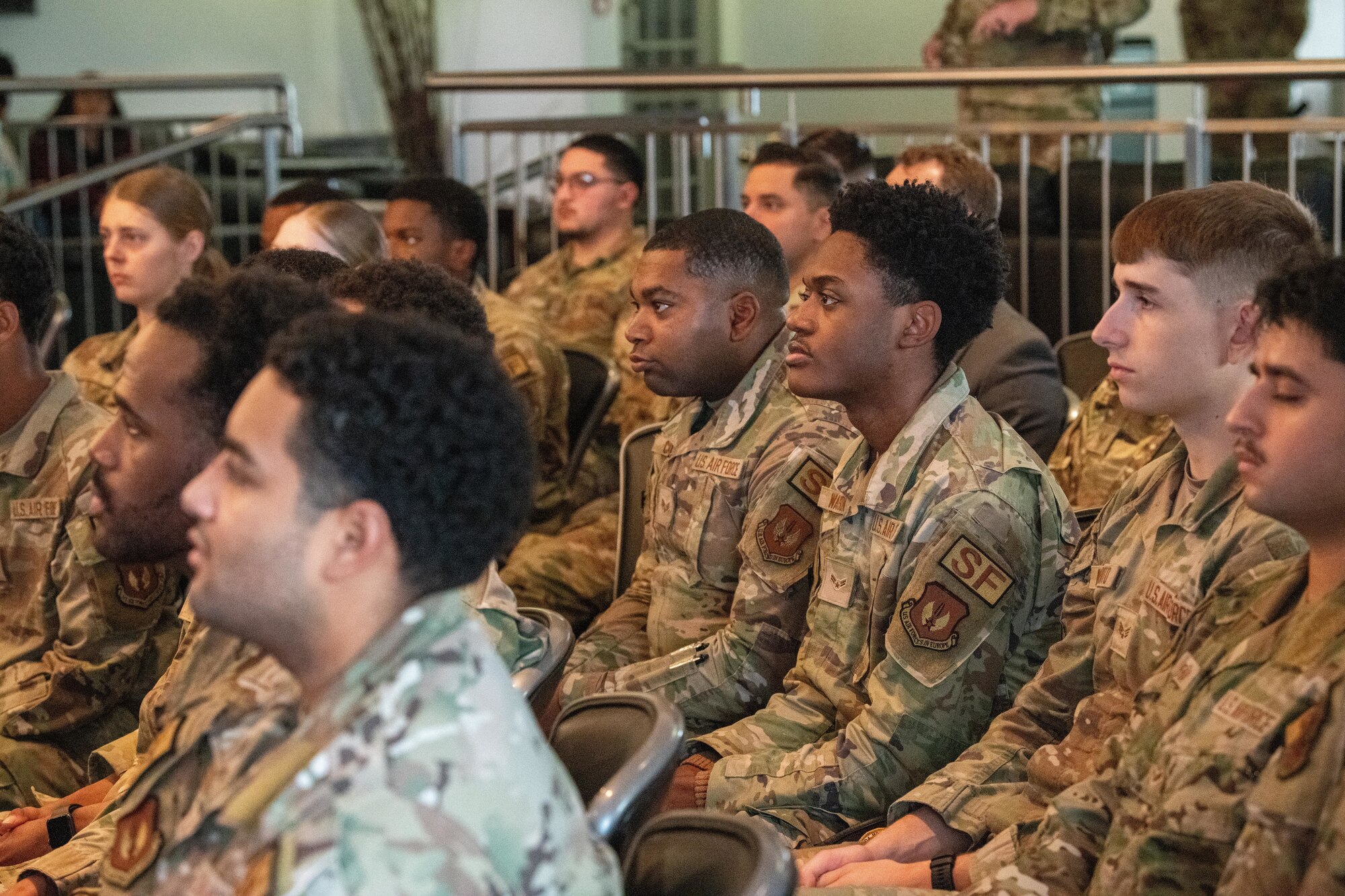Defenders from across the 501st Combat Support Wing listen during an all call