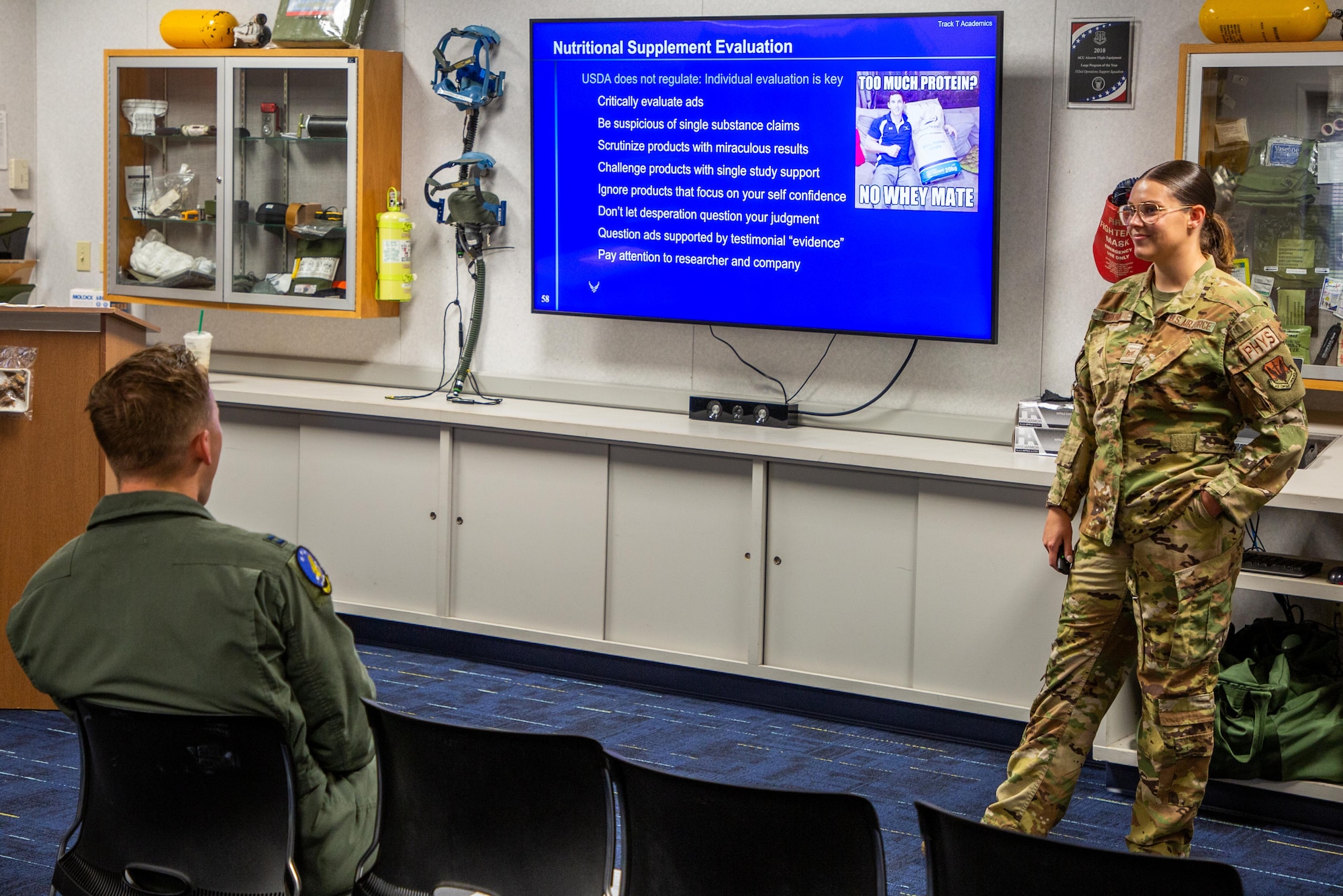 SSgt Logan Graham leads a class of aviators while emphasizing the critical role physiology plays in flight safety. Her instruction equips members with the knowledge to recognize and respond to to altitude-related challenges like hypoxia and spatial disorientation.