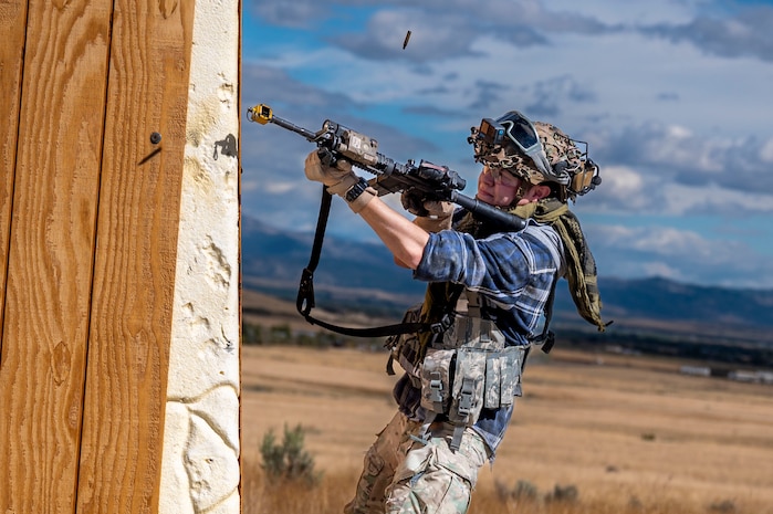A person shooting a gun.