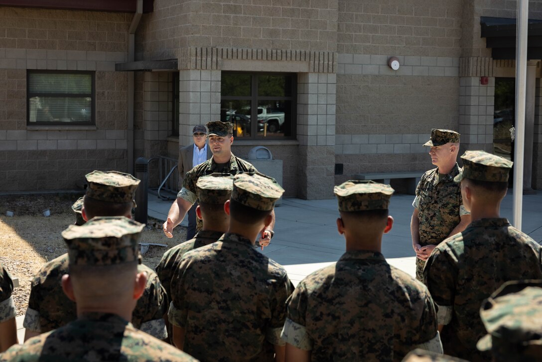 U.S. Marine Corps Staff Sgt. Brett Meil, a Marine combat instructor with Training Company, Infantry Training Battalion (ITB), School of Infantry West, addresses Marines with ITB during an award ceremony at Marine Corps Base Camp Pendleton, California, Sept. 24, 2024. During the ceremony, Meil was presented with the Navy and Marine Corps Medal, the highest non-combat decoration that can be awarded for heroism, for his actions on June 13, 2023, where he saved a student’s life and took shrapnel in the process. (U.S. Marine Corps photo by Cpl. Sydni Jessee)