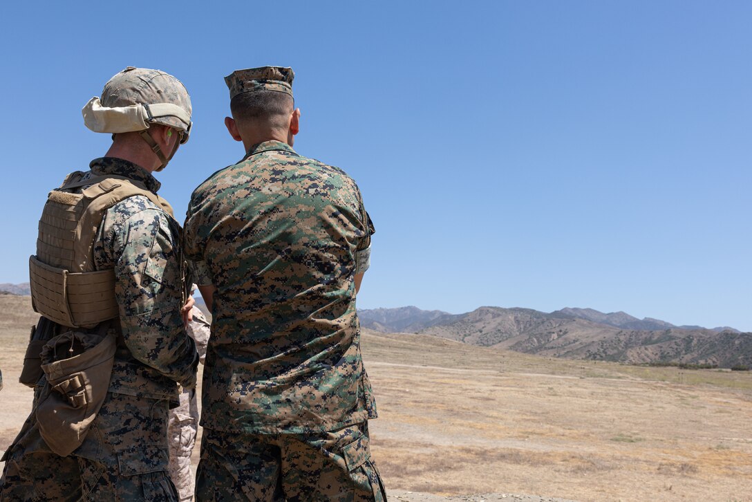 U.S. Marine Corps Sgt. Maj. Carlos A. Ruiz, Sergeant Major of the Marine Corps, speaks to a student with the Infantry Training Battalion at Marine Corps Installations West Marine Corps Base Camp Pendleton, Calif., Aug. 26, 2024. Sgt. Maj. Ruiz toured MCB Camp Pendleton, interacted personally with Marines, and emphasized the Barracks 2030 plan to improve Marines’ welfare through barracks modernization. (U.S. Marine Corps photo by Lance Cpl. Jeslianne A. Torres)