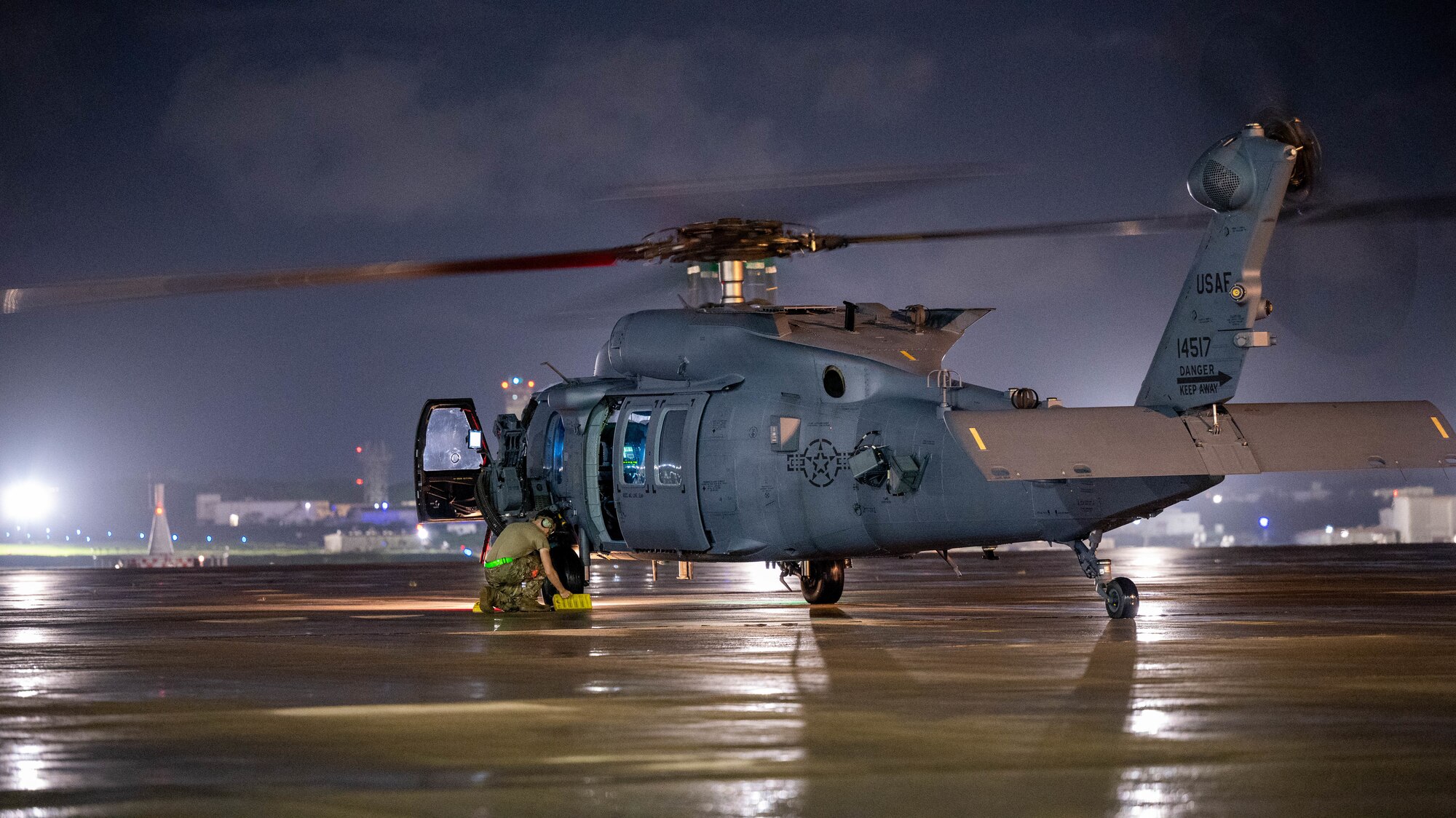 A HH-60W fnishes landing at Kadena Air Base