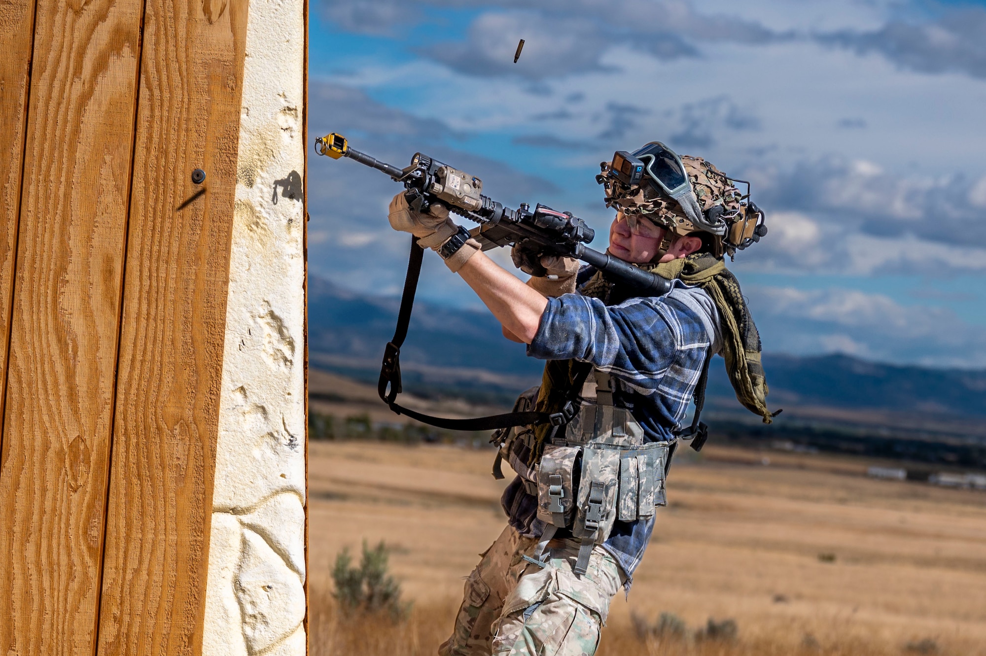 A person shooting a gun.