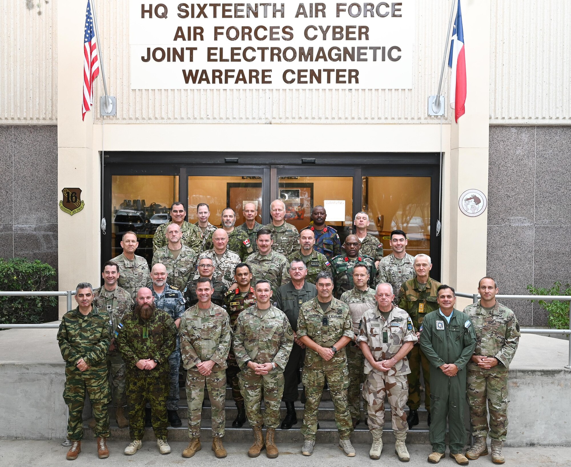 16th AF leadership and attaches pose for group photo.