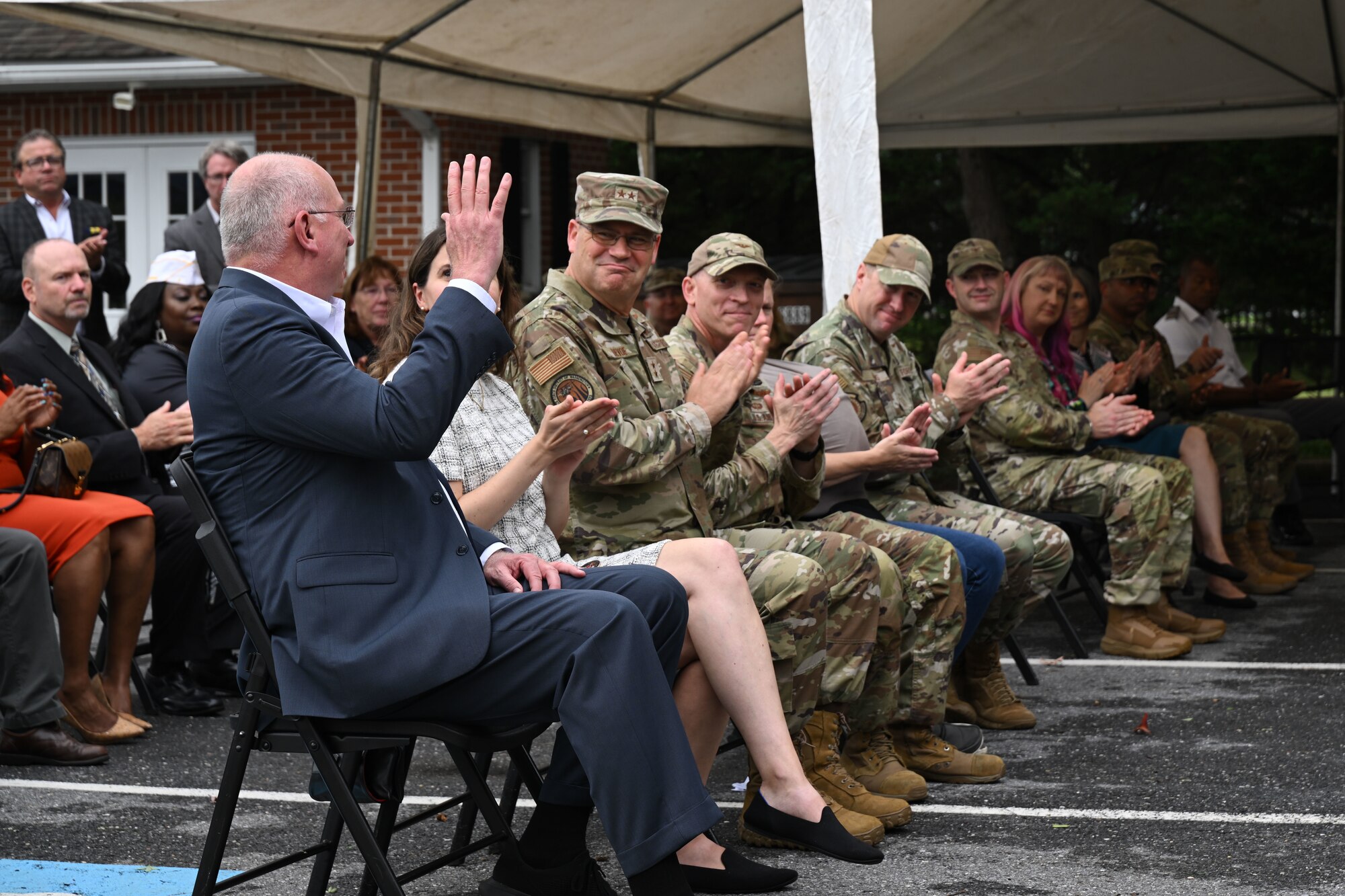 David Croker, Fisher House Foundation president, is introduced during the 30th anniversary event of the Fisher House, Joint Base Andrews, Md., Sept. 26, 2024. As of May 2023, the foundation has provided free lodging to more than 455,000 military and veteran families, saving them over $575 million in lodging and transportation costs. (U.S. Air Force photo by Airman 1st Class Gianluca Ciccopiedi)