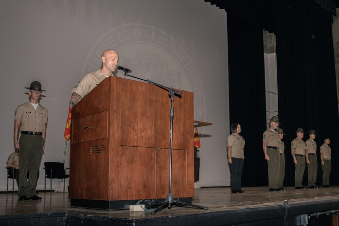 U.S. Marine Corps Sgt. Maj. Joey Cruz with Recruit Training Regiment, introduces the staff of Drill Instructor School during the graduation ceremony for class 4-24 at Marine Corps Recruit Depot San Diego, California, Sept. 25, 2024. For the past 11 weeks the newly graduated drill instructors enhanced their leadership qualities, command presence, instructional ability, physical fitness and knowledge of selected officers and staff noncommissioned officers in order to successfully perform the duties of a drill instructor. The Marines will now go to their assigned Battalions at MCRD San Diego to train recruits for the remainder of their tour. (U.S. Marine Corps photo by Cpl. Sarah M. Grawcock)