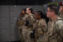 Defenders stand at ease during guard mount