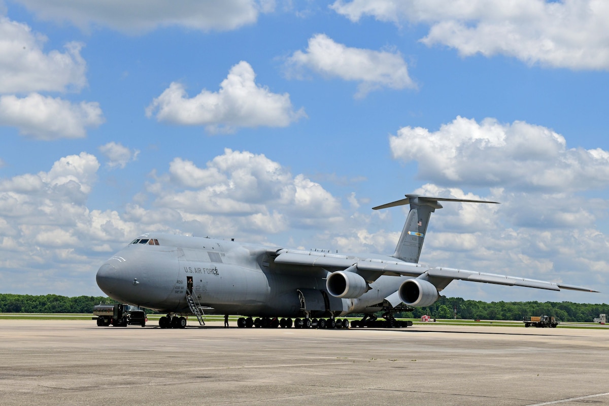 Large aircraft sitting on tarmac