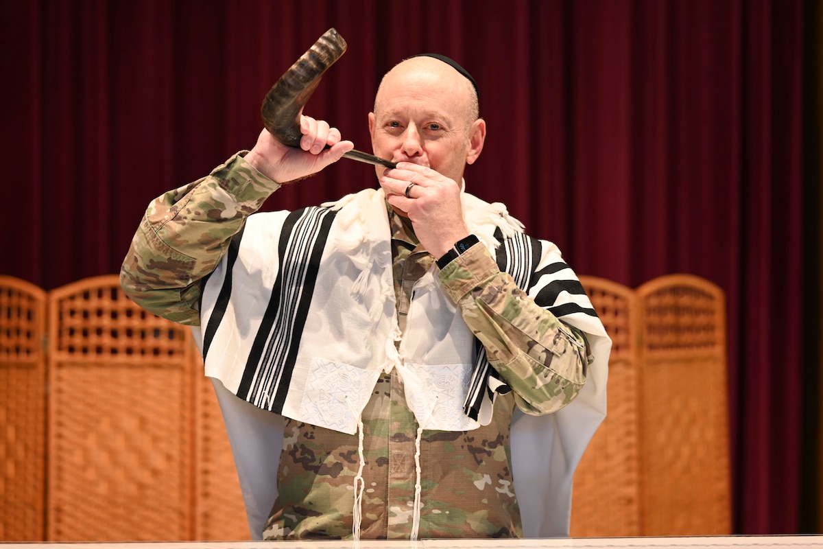 U.S. Air Force Lt. Col. Joseph Friedman, 49th Wing chaplain, plays the shofar, an ancient musical horn played during Jewish ceremonies, at Holloman Air Force Base, New Mexico, Sep. 24, 2024. Chaplain Friedman is serving as the wing's chaplain under a Military Personnel Appropriation, a tour of active duty authorized to support the short-term needs of the active force. (U.S. Air Force photo by Airman 1st Class Michelle Ferrari)
