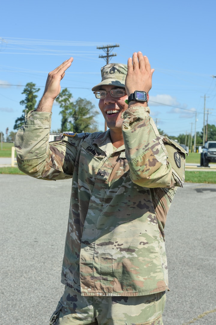 U.S. Army Staff Sgt. Kevin Garcia, a tank commander assigned to Bravo Company, 1-118th Infantry Regiment, Armored Brigade Combat Team, distributes water and supplies in Gaffney, South Carolina, Oct. 2, 2024.