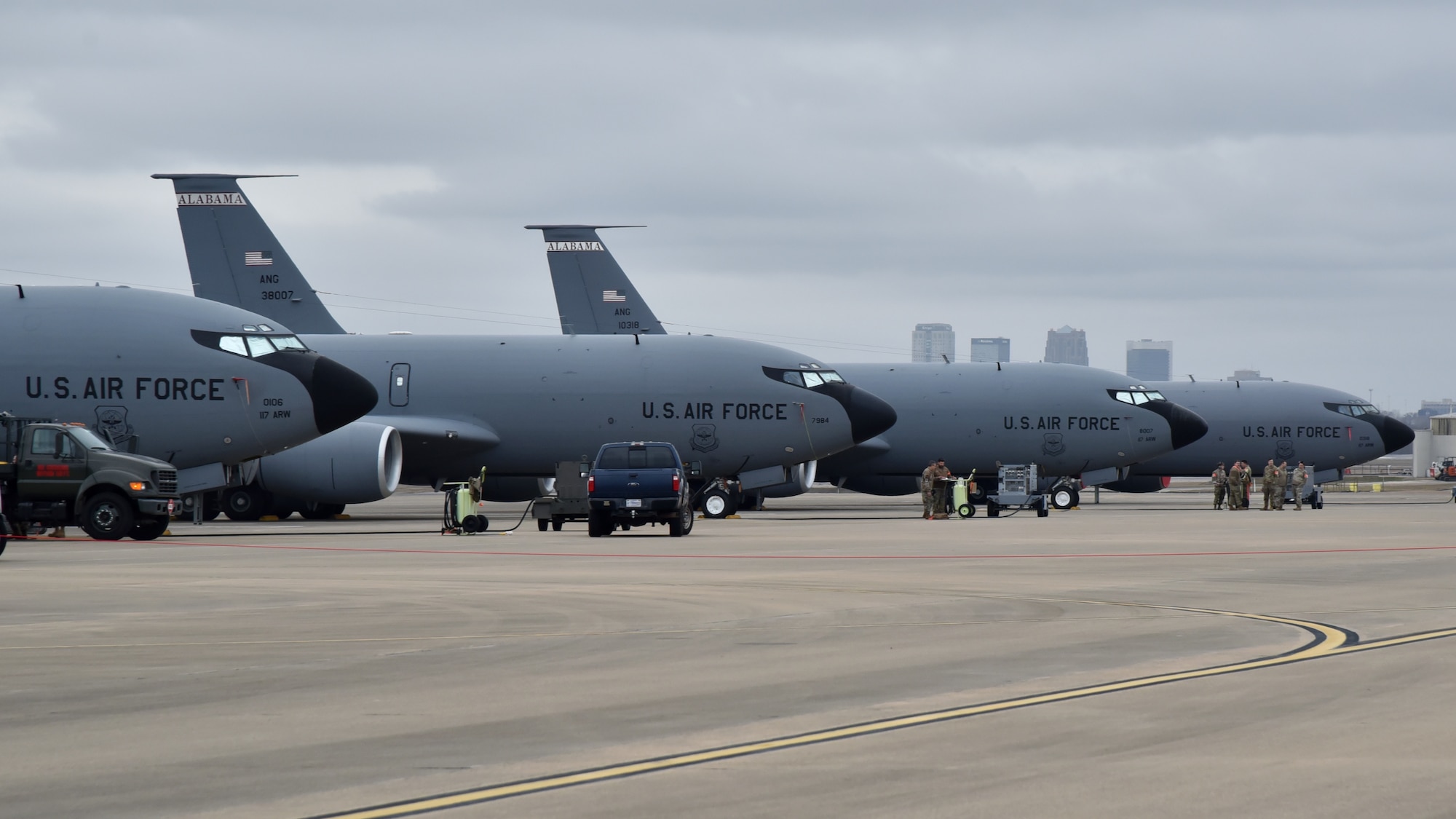 Airmen from the 117th Air Refueling Wing work on the flight line at Sumpter Smith Joint National Guard Base, Alabama, Feb. 9, 2024. The mission of the 117 ARW is to provide quality worldwide air refueling, airlift, support, logistics, intelligence, and medical services in support of its community, state, and the nation with its KC-135R Stratotanker fleet. (U.S. Air National Guard photo by Staff Sgt. Shelby Thurman) (This photo has been altered for security purposes by blurring out identification badges.)
