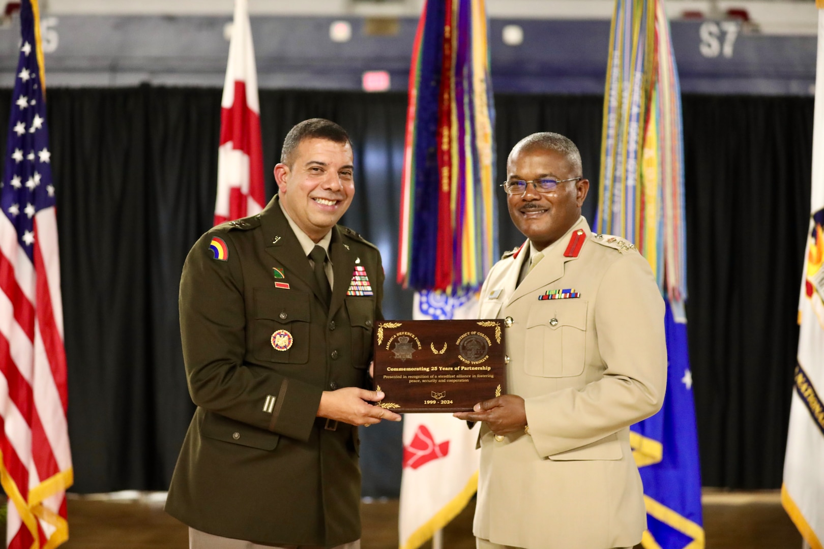 Maj. Gen. John C. Andonie, Commanding General (Interim), D.C. National Guard, welcomes Brigadier Markland Lloyd, Force Executive Officer (FXO), Jamaica Defence Force; Warrant Officer Class One (WO1) Michael Moulton, Force Sergeant Major (FSM), and Brigadier Ricardo Blidgen, Brigade Commander for the Jamaican National Reserve (JNR) during the Commanding General’s Reception at the D.C. Armory, Oct. 5, 2024. The reception honored a 25-year State Partnership Program pairing and was attended by current and former State Partnership Program directors, the Embassy of Jamaica, city government and others who contributed to the quarter-century milestone.