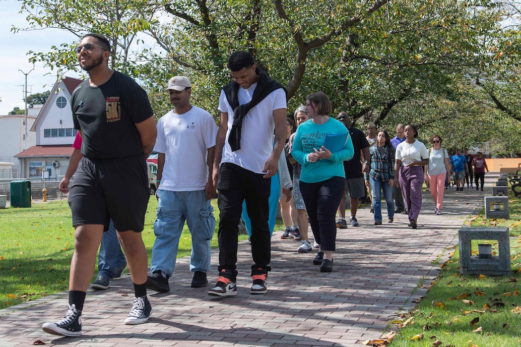 Community members at Commander, Fleet Activities Yokosuka (CFAY) participate in the suicide prevention and awareness event "A Walk to Remember" held at Kosano Park onboard CFAY.