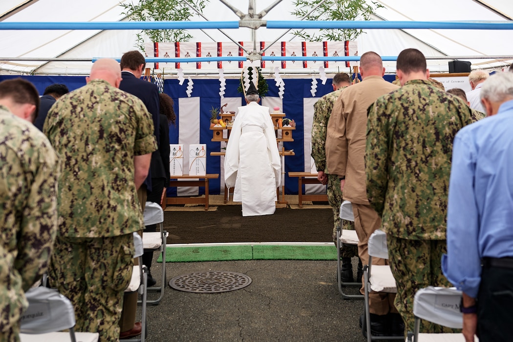 A Shinto priest performs a Jichinsai at the site of the Ship Handling and Combat Training Facilities outside the Afloat Training Group Building onboard Commander, Fleet Activities Yokosuka October 7, 2024. A Jichinsai is a Shinto ritual asking permission to use the land for building and pray for the workers' safety throughout the project's work.