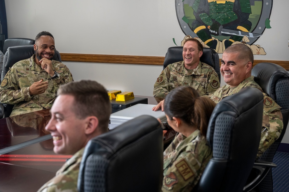 The 35th Fighter Wing command team attends a brief hosted by the 35th Comptroller Squadron regarding the end of fiscal year closeout at Misawa Air Base, Japan, Sept. 30, 2024.