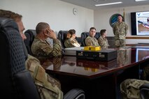 The 35th Fighter Wing command team attends a brief hosted by the 35th Comptroller Squadron regarding the end of fiscal year closeout at Misawa Air Base, Japan, Sept. 30, 2024.