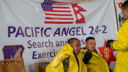 Nepali Army members await care after a simulated hazardous material emergency during Pacific Angel 24-2 in Kathmandu, Nepal, Sept. 17, 2024. PA 24-2’s objective is to promote humanitarian assistance and disaster response capacity-building by facilitating military, civilian and nongovernmental organization cooperation and improve search and rescue collaboration between the United States and Nepal.