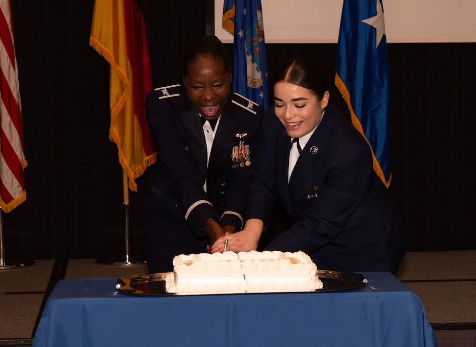 Col Wyche and Airman Basic Pallares cuts the cake