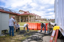 Hurricane Helene knocked out power as it swept past Fort Eisenhower. Teams from the Department of Public Works were out setting up emergency generators to get facilities back on. This is Dining Facility #1 coming powering up to feed the Soldiers. The local municipalities, community partners, and Army came together to support each other and the surrounding communities in the wake of Hurricane Helene. Fort Eisenhower sustained significant damage, loss of power, and loss of water service.