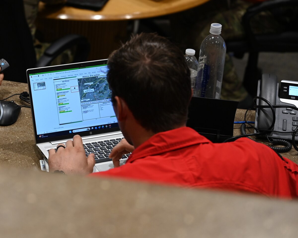A U.S. Airman assigned to the 48th Rescue Squadron, forward deployed as the 563rd Personnel Recovery Task Force, reviews a medical assessment plan at McGhee Tyson Air National Guard Base, Tennessee, Oct. 2, 2024, in support of the U.S. Northern Command and Air Forces Northern, Defense Support of Civil Authorities Disaster Relief mission. Medical contingency plans were prepared to provide maximum Air Force rescue and recovery capabilities for civilians impacted by Hurricane Helene. (U.S. Air Force photo by Staff Sgt. Abbey Rieves)