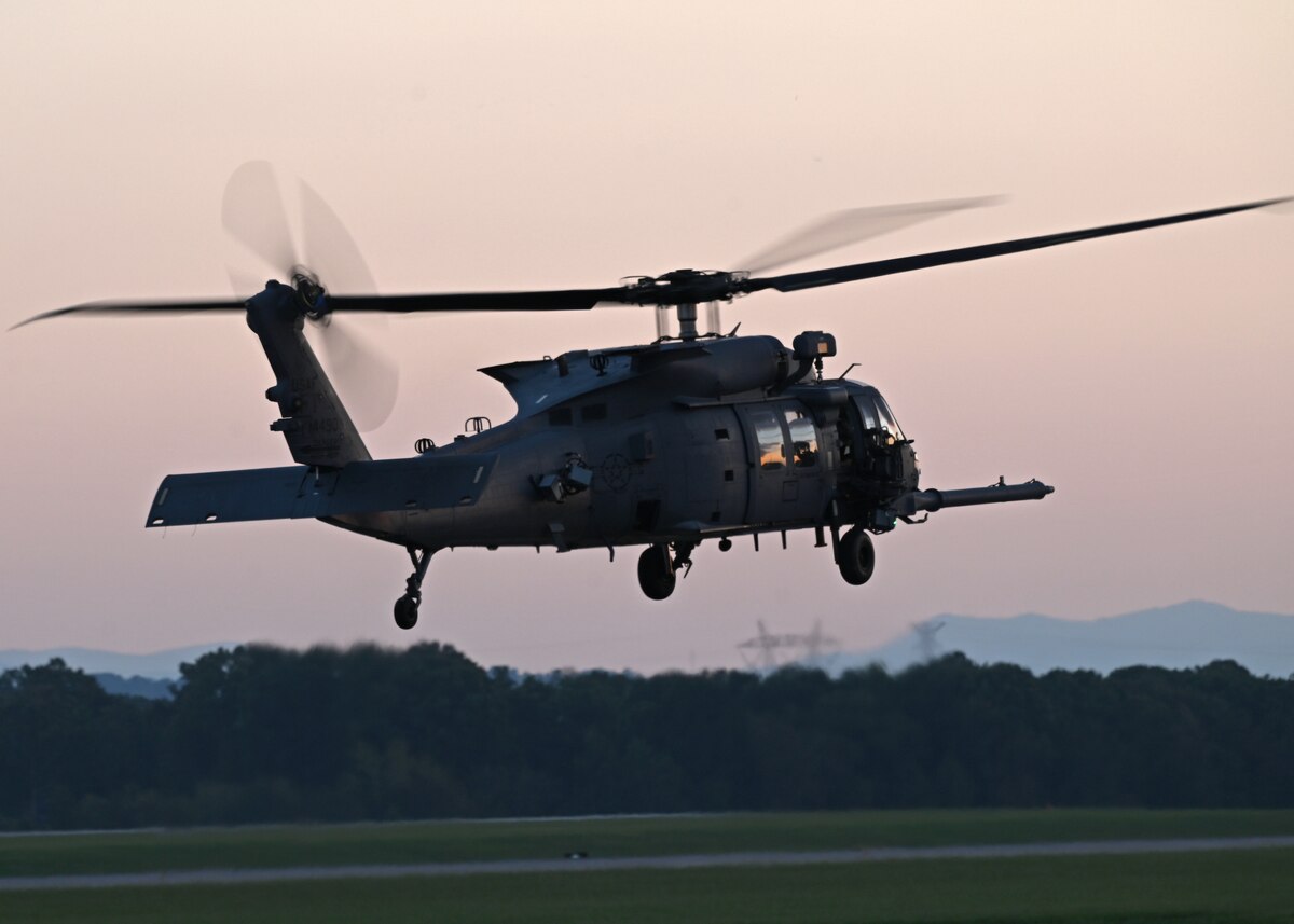 An HH-60W Jolly Green II helicopter assigned to the 55th Rescue Squadron, forward deployed in the 563rd Personnel Recovery Task Force, prepares to land at McGhee Tyson Air National Guard Base, Tennessee, Oct. 2, 2024, in support of the U.S. Northern Command and Air Forces Northern, Defense Support of Civil Authorities Disaster Relief mission. Rescue assets from Davis-Monthan Air Force Base, Arizona practiced rescue and recovery operations to serve residents impacted by Hurricane Helene. (U.S. Air Force photo by Staff Sgt. Abbey Rieves)