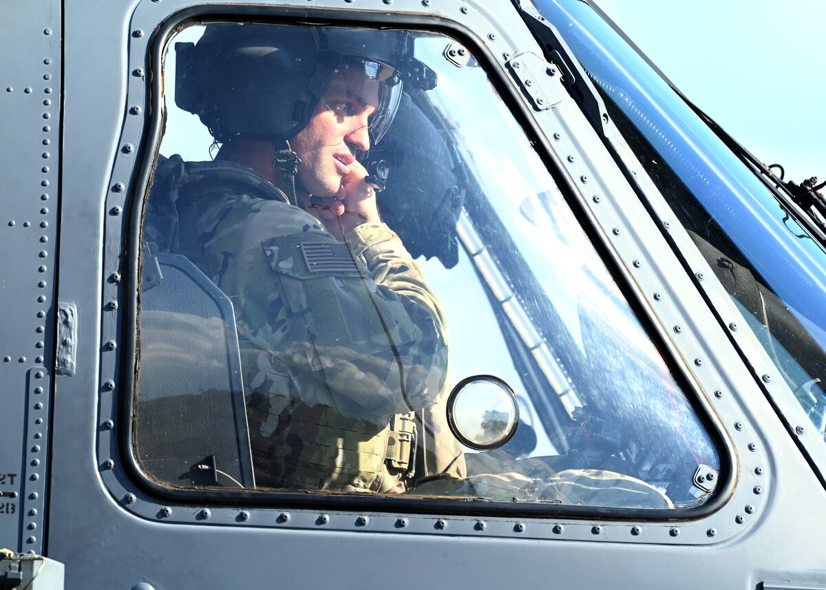 U.S. Air Force Capt. Ryan Biggs, 55th Rescue Squadron HH-60W Jolly Green II helicopter pilot, forward deployed in the 563rd Personnel Recovery Task Force, prepares for takeoff in Tennessee, Oct. 2, 2024, in support of the U.S. Northern Command and Air Forces Northern, Defense Support of Civil Authorities Disaster Relief mission. USNORTHCOM’s support of lead federal agencies in the aftermath of a natural disaster remains a core mission that directly bolsters our homeland defense enterprise, while delivering rapid relief to American citizens in times of great need. (U.S. Air Force photo by Staff Sgt. Abbey Rieves)