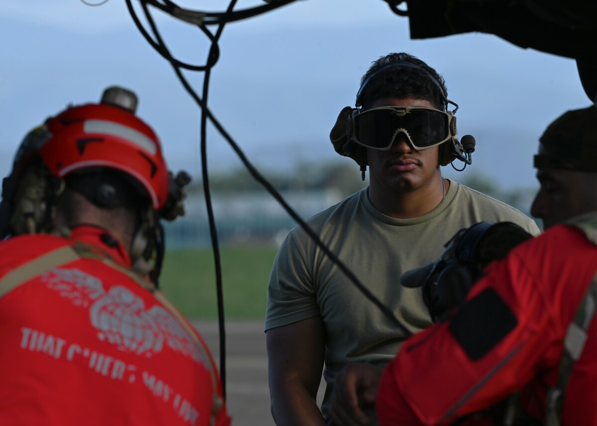 U.S. Air Force Senior Airman Eric Bailey, 55th Rescue Generation Squadron, forward deployed as the 563rd Personnel Recovery Task Force, conducts preflight checks at McGhee Tyson Air National Guard Base, Tennessee, Oct. 3, 2024, in support of the U.S. Northern Command and Air Forces Northern, Defense Support of Civil Authorities Disaster Relief mission. The Department of Defense has unique capabilities, including an ability to deploy on short notice into austere environments, while providing resources that are not readily available in other federal agencies or the private sector. (U.S. Air Force photo by Staff Sgt. Abbey Rieves)
