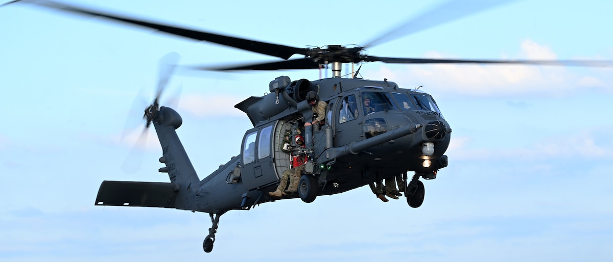 An HH-60W Jolly Green II helicopter assigned to the 55th Rescue Squadron, forward deployed as the 563rd Personnel Recovery Task Force, prepares to land at McGhee Tyson Air National Guard Base, Tennessee, Oct. 3, 2024, in support of the U.S. Northern Command and Air Forces Northern, Defense Support of Civil Authorities Disaster Relief mission. Rescue assets from Davis-Monthan Air Force Base, Arizona practiced rescue and recovery operations to serve residents impacted by Hurricane Helene. (U.S. Air Force photo by Staff Sgt. Abbey Rieves)