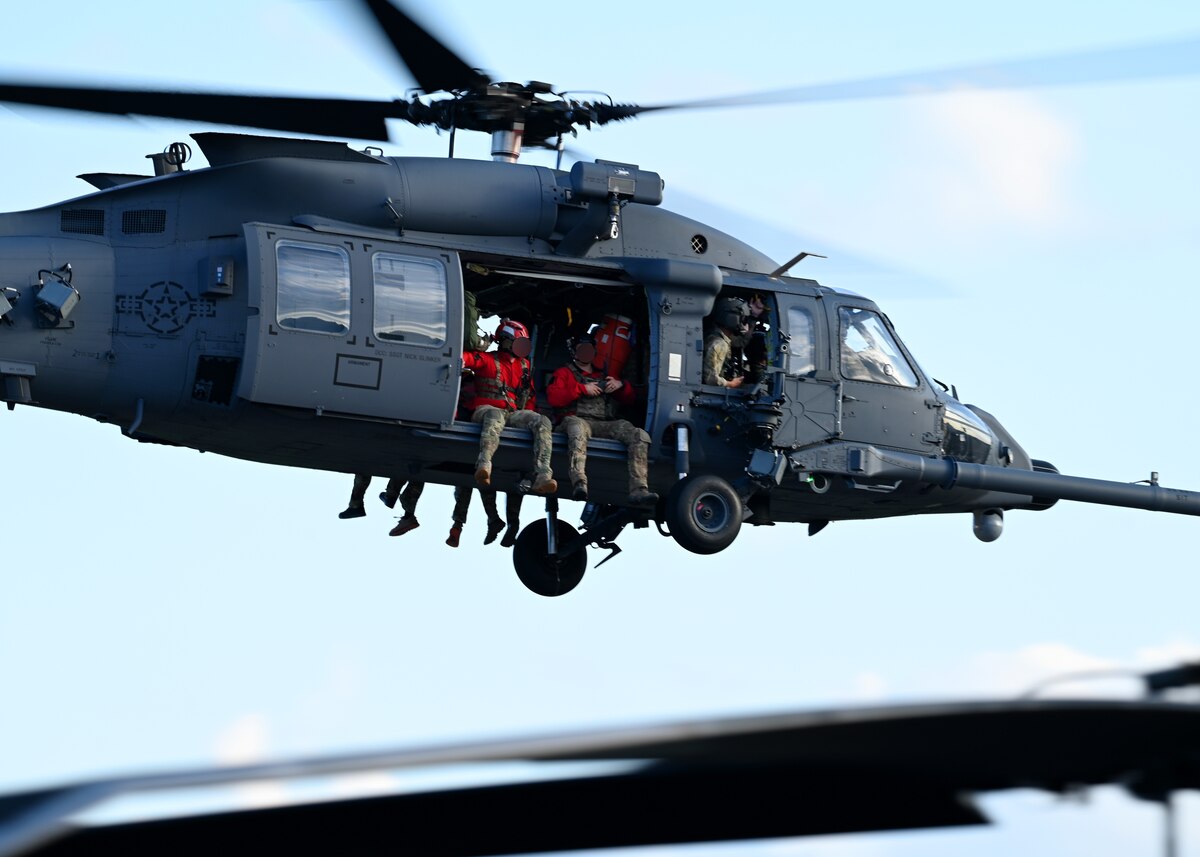 A U.S. Air Force rescue team assigned to the 55th Rescue Squadron and 48th Rescue Squadron, forward deployed as the 563rd Personnel Recovery Task Force, launches for a mission from McGhee Tyson Air National Guard Base, Tennessee, Oct. 3, 2024, in support of the U.S. Northern Command and Air Forces Northern, Defense Support of Civil Authorities Disaster Relief mission. The Department of Defense's collaborative, whole-of-government response efforts with interagency partners demonstrate national capabilities and resilience. (U.S. Air Force photo by Staff Sgt. Abbey Rieves) (Note this photo has been altered for security purposes by blurring out facial identification.)