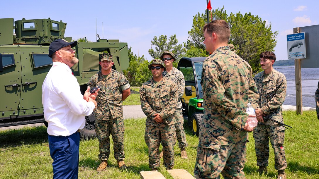 U.S. Rep. Aaron Bean, R-Fla., speaks with Marines during a visit Aug. 8, 2024, to Marine Corps Support Facility Blount Island in Florida.