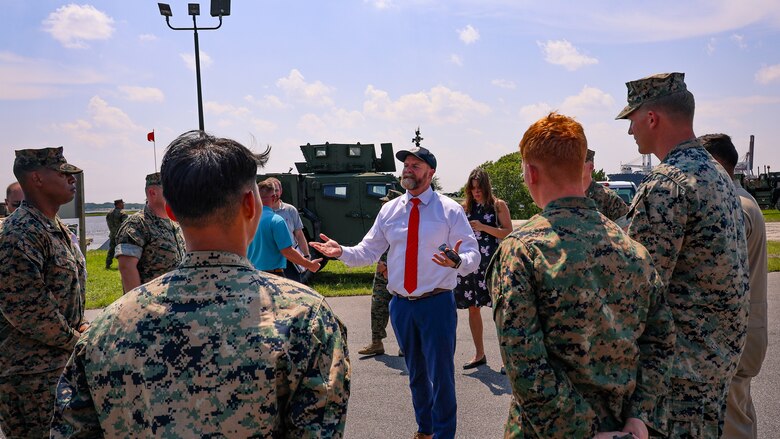U.S. Rep. Aaron Bean, R-Fla., speaks with Marines during a visit Aug. 8, 2024, to Marine Corps Support Facility Blount Island in Florida.