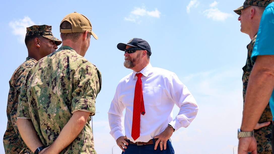 U.S. Marine Corps Lt. Col. Anthony Ansley, commanding officer, Combat Logistics Battalion 22, 2nd Marine Logistics Group, provides an overview of Exercise Coastal Response for U.S. Rep. Aaron Bean, R-Fla., during a visit Aug. 8 to Marine Corps Support Facility Blount Island in Florida.