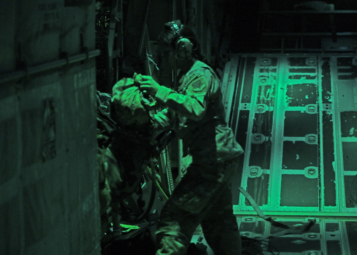 U.S. Air Force Airman 1st Class Jocelyn Lopez, 79th Rescue Squadron loadmaster, forward deployed in the 563rd Personnel Recovery Task Force, operates inside an HC-130J Combat King II in Asheville, North Carolina, Oct. 3, 2024, in support of the U.S. Northern Command and Air Forces Northern, Defense Support of Civil Authorities Disaster Relief mission. The HC-130J Combat King II aircraft’s mission is to provide aerial refueling capabilities to search and rescue HH-60W Jolly Green II helicopters. (U.S. Air Force photo by Staff Sgt. Abbey Rieves)