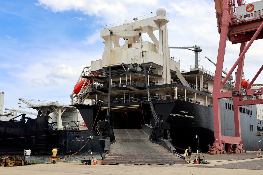 USNS GySgt. Fred W. Stockham is staged for offloading Aug. 22, 2024, at Marine Corps Support Facility Blount Island in Florida. USNS 1st Lt. Baldomero Lopez and USNS Stockham deployed in March and April, respectively, as part of a whole-of-government humanitarian response to the October 2023 terrorist attacks that killed more than 1,000 civilians in Israel, including U.S. citizens. The U.S. Navy’s roll-on, roll-off support cargo ships offloaded more than 5,700 pallets of food, along with fuel for the Army's Joint Logistics Over-the-Shore temporary pier modules, tugs, boats and trucks. They also transported roughly 240 military personnel from Florida to Gaza. With the ships back at Blount Island, leadership teams from the U.S. Navy’s Military Sealift Command and U.S. Marine Corps’ Blount Island Command, strategic partners in the U.S. Marine Corps prepositioning mission, walked aboard USNS Stockham to thank the captains and their crews. An executive team from Crowley Government Solutions, contracted to operate and maintain the massive vessels, highlighted numerous individual efforts that were critical to the response effort.
